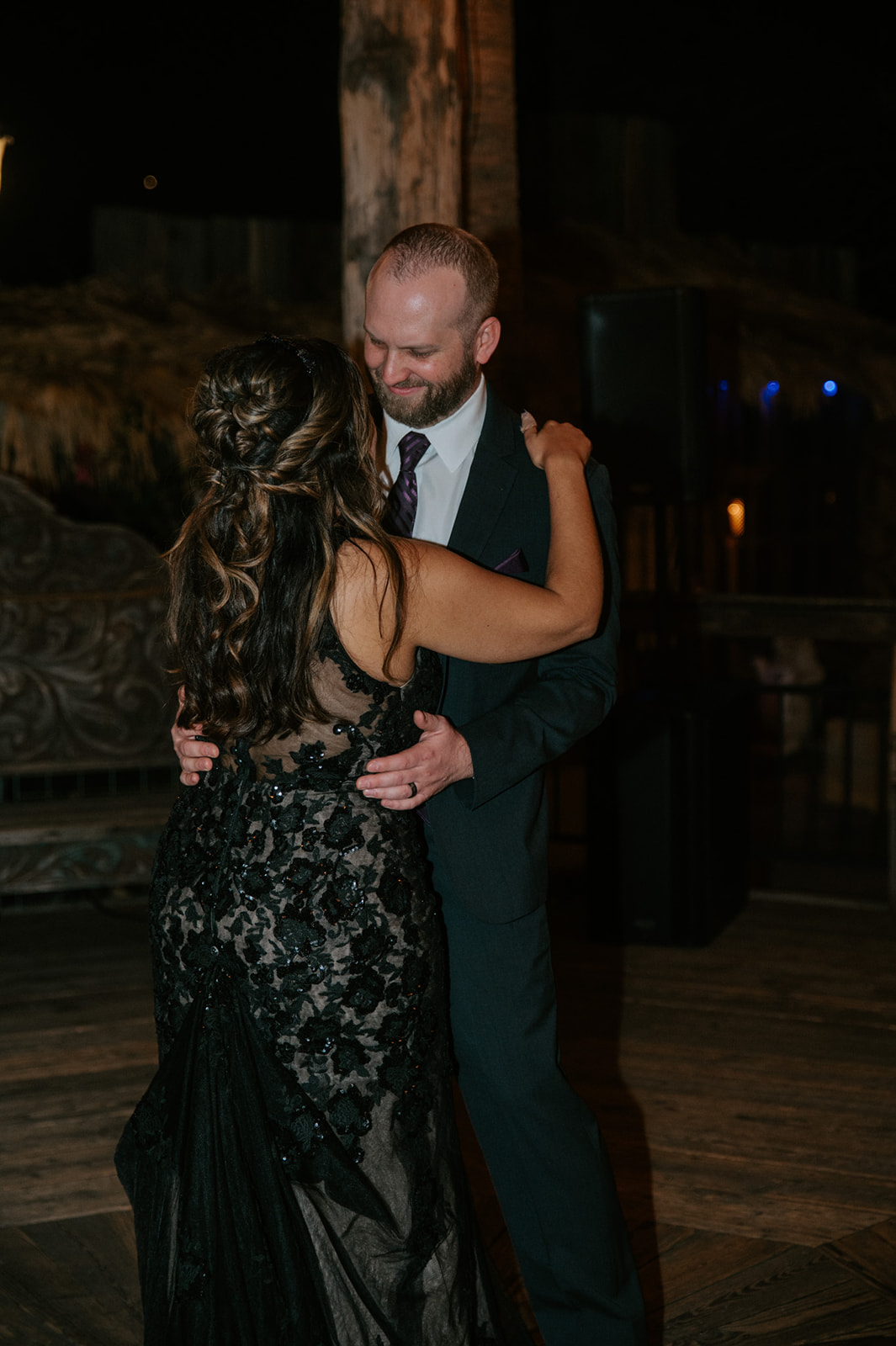 Bride and groom sharing their first dance during the wedding reception.
