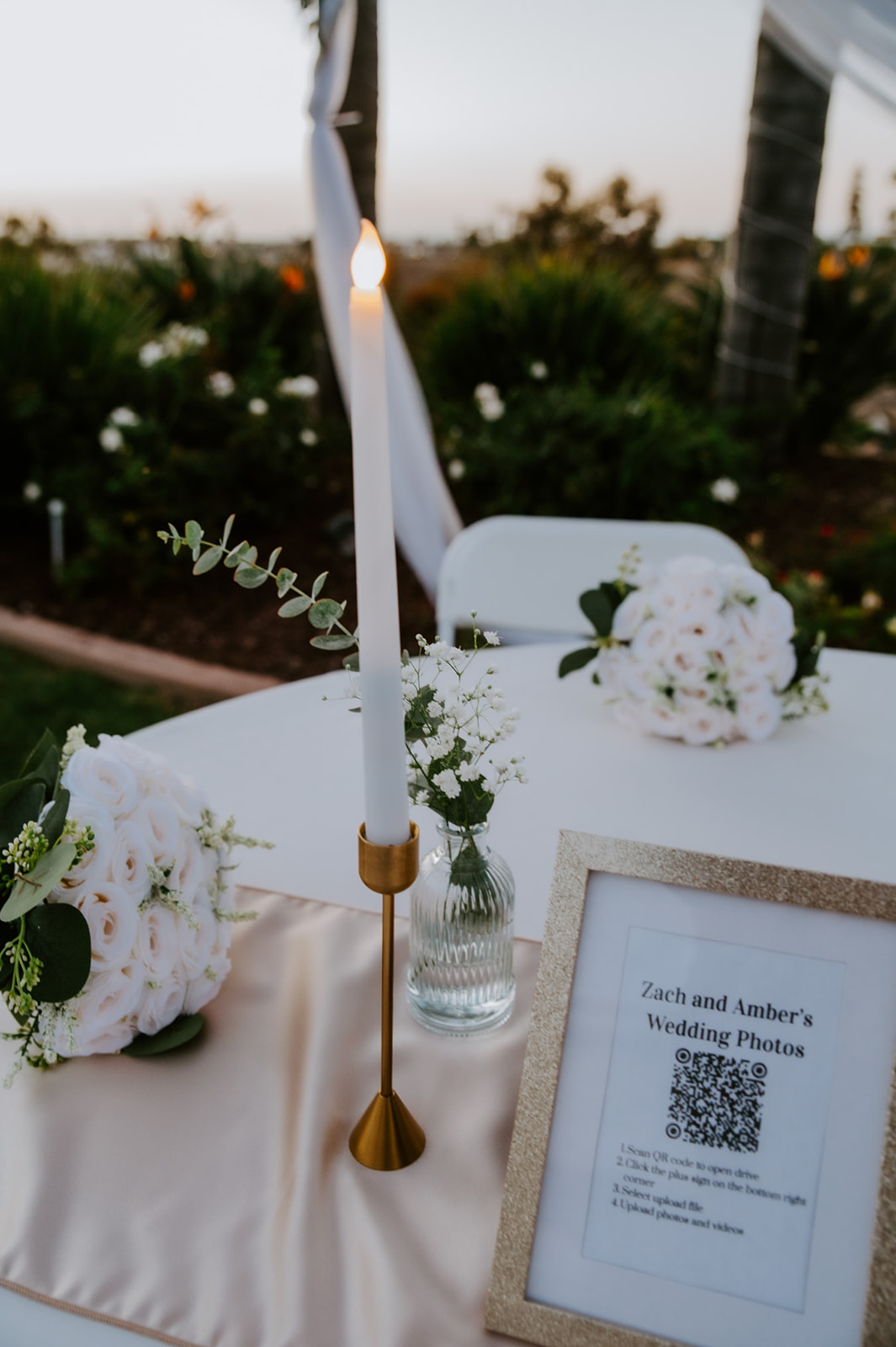 Minimal ceremony table with candles and florals at a family elopement, showing how to plan an elopement with family in a meaningful way