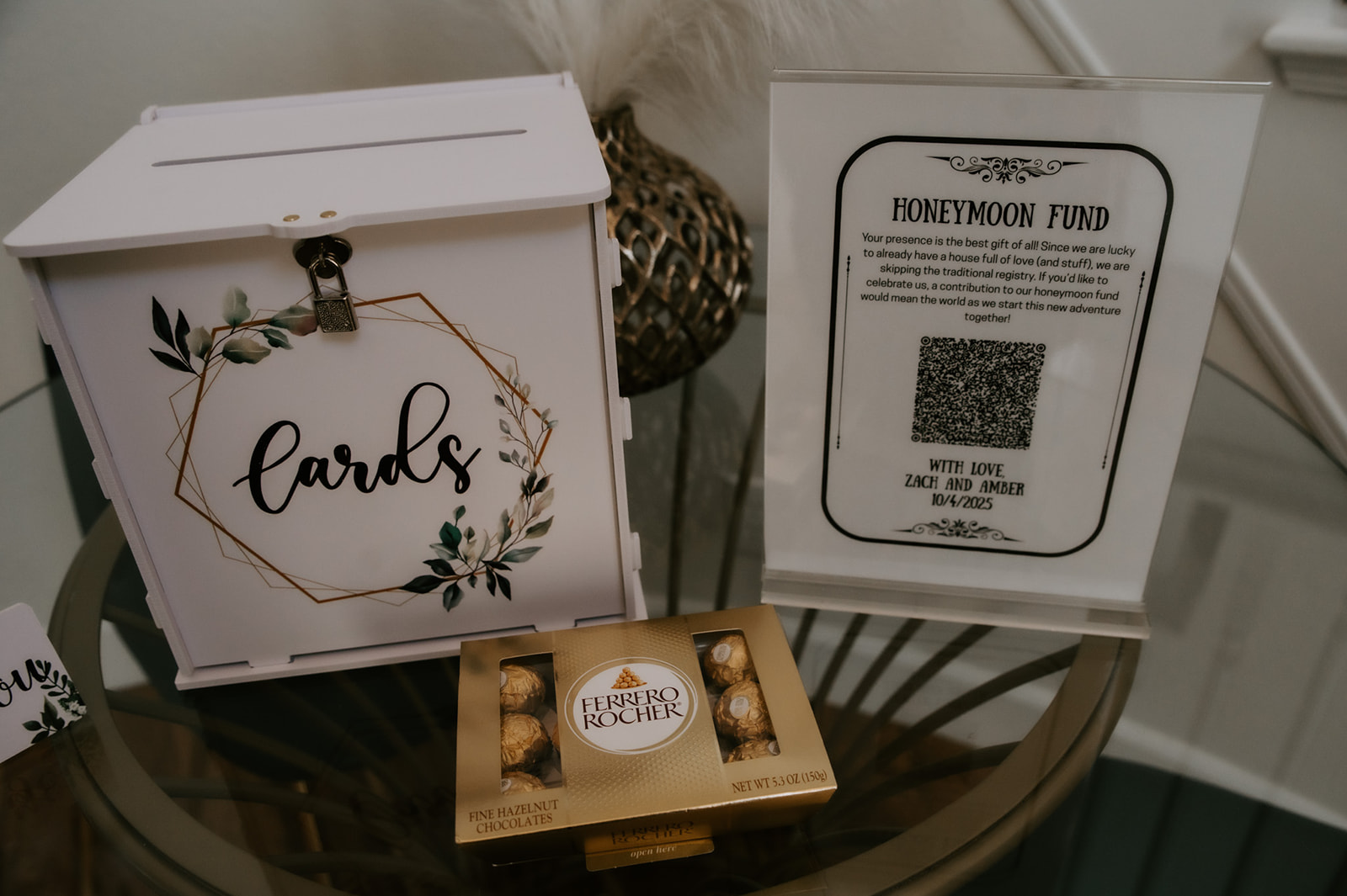 Wedding card box and honeymoon fund sign set up for an intimate family elopement celebration