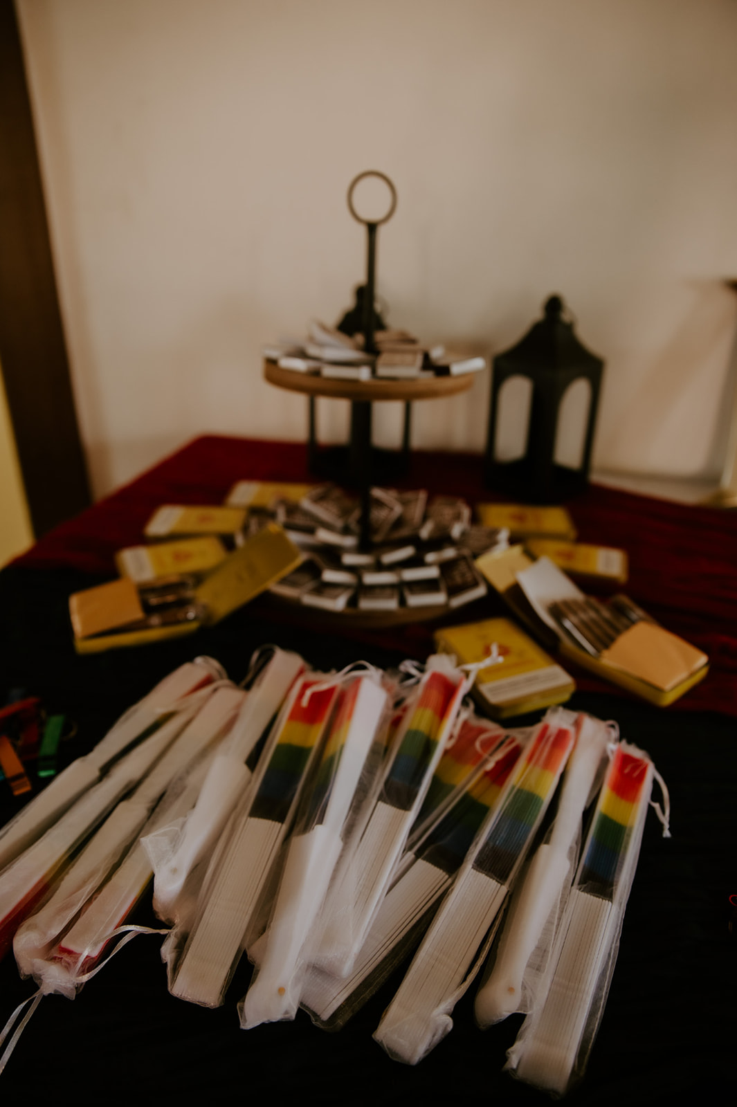 Rainbow wedding favors displayed on a reception table during an LGBTQ wedding celebration photographed by an LGBTQ wedding photographer